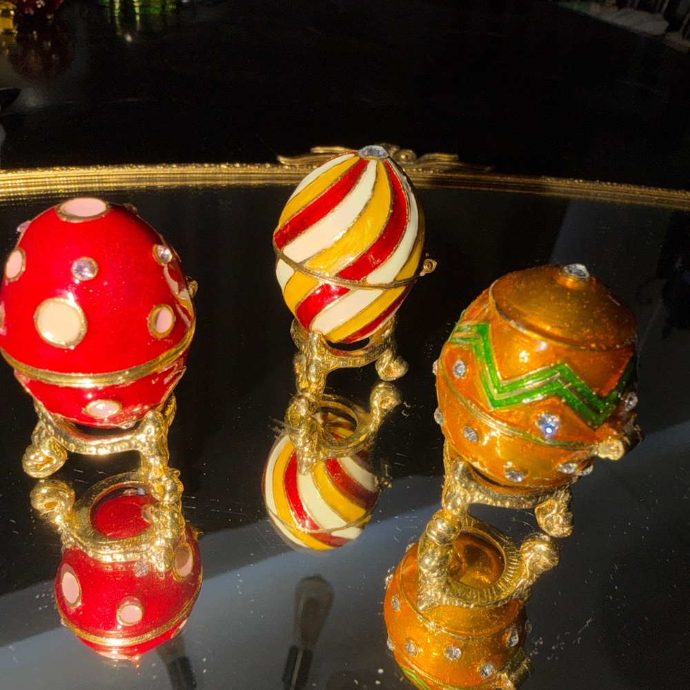 Three Miniature Enameled Eggs Made by Work of Art